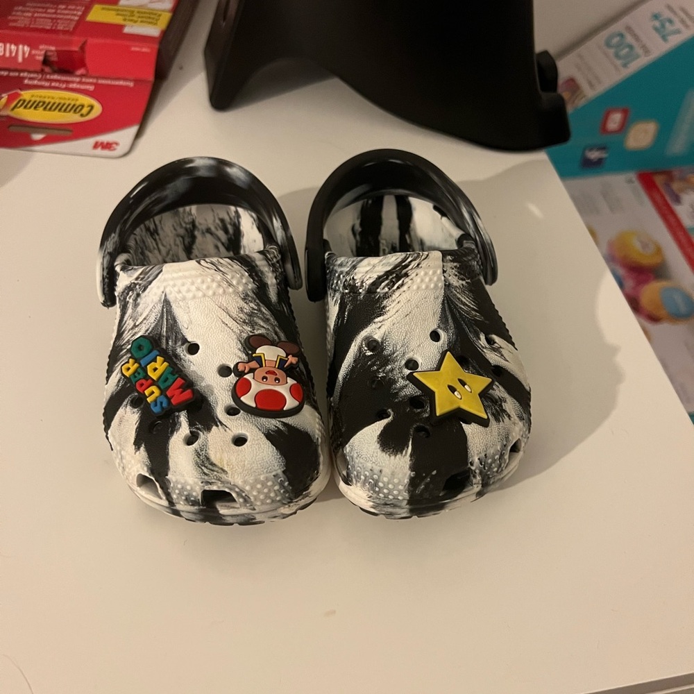 CROCS Kids Black and White Clogs with Fun Charms